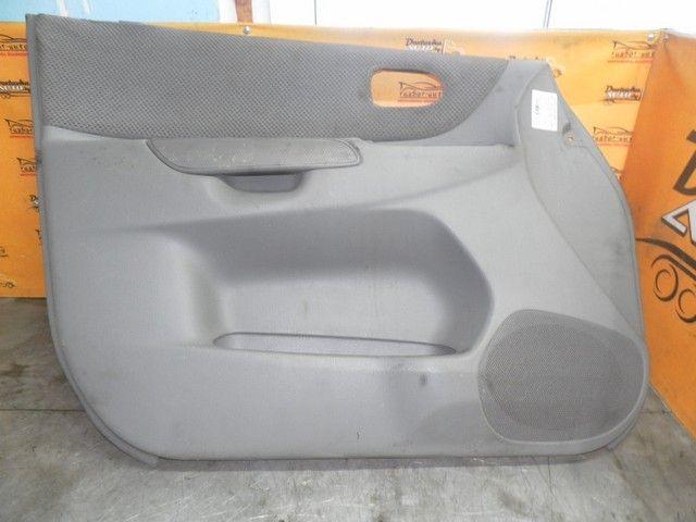 Обшивка двери передней левой (дверная карта) 1IKB68 Mazda Premacy