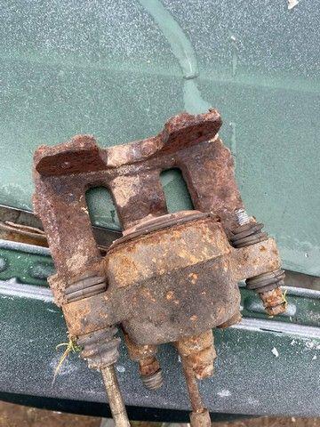 Суппорт передний правый 977A25 Kia Carnival