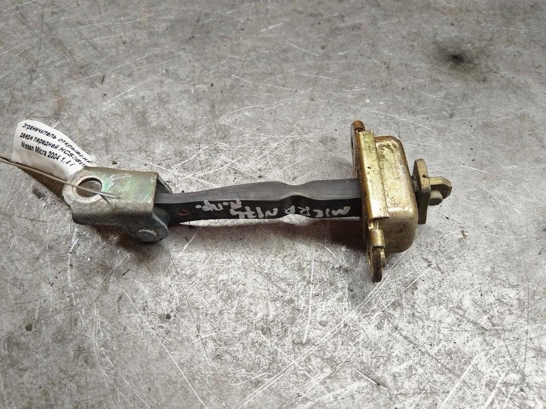 Ограничитель открывания двери передней HCS36W Nissan Micra купить в магазине запчастей бу