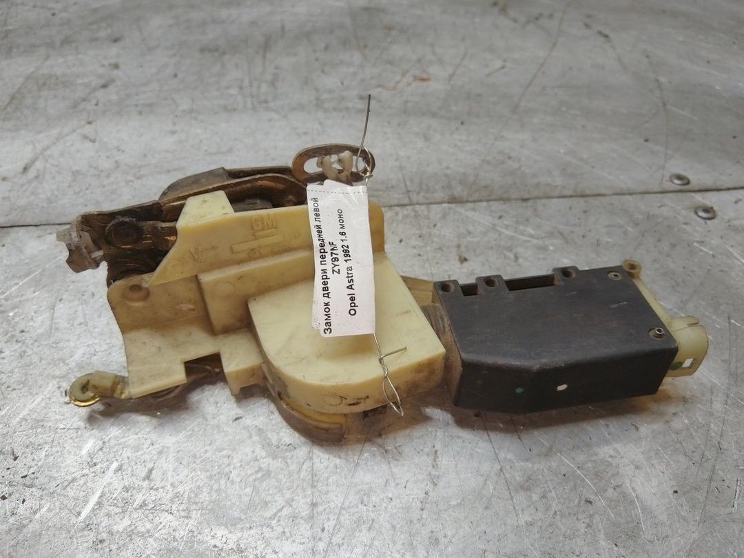 Замок двери передней левой ZY97NF Opel Astra купить