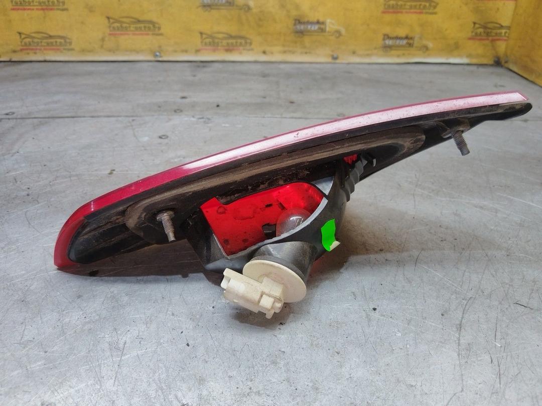 Фонарь крышки багажника левый NE80T8 Mitsubishi Colt купить