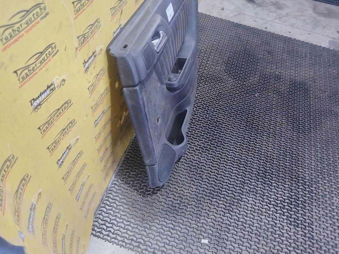 Обшивка двери задней правой (дверная карта) 4O52BJ Opel Astra купить в магазине запчастей бу