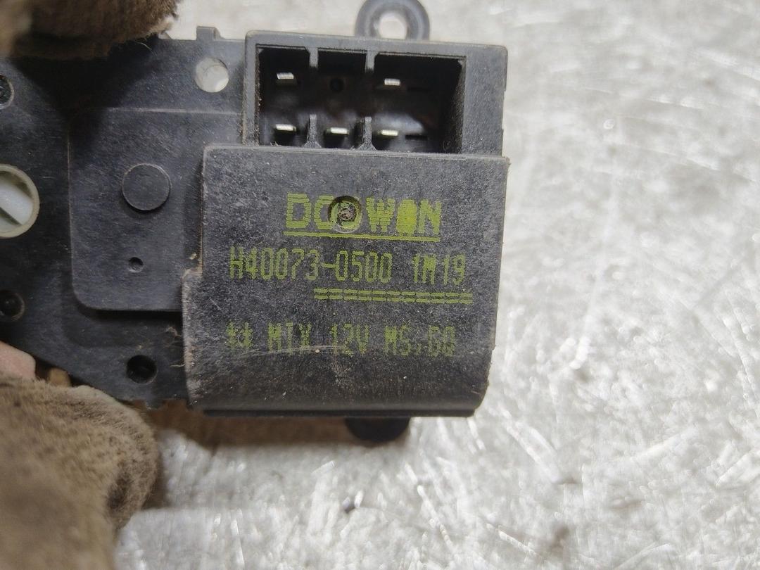 Моторчик заслонки печки OUD36M Kia Carnival купить