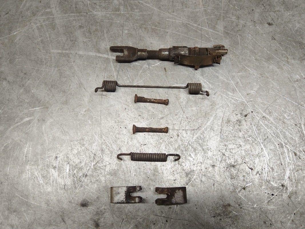 Механизм развода задних тормозных колодок левый MK7LZD Nissan Note - Фото 1