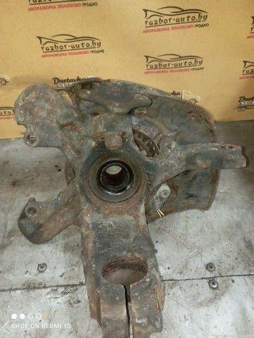 Кулак поворотный правый 7QWY54 Volkswagen Golf купить в магазине запчастей бу