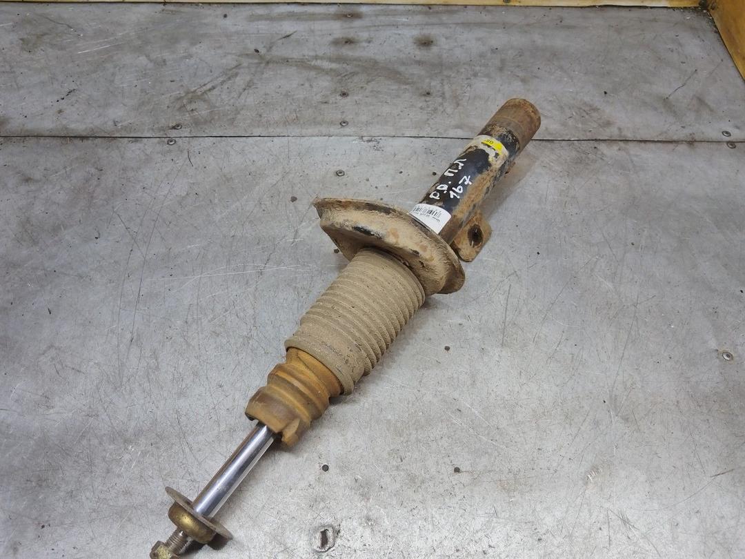 Амортизатор передний левый 7O9K98 Peugeot Partner - Фото 1