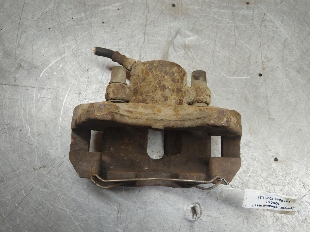 Суппорт передний левый 1QB01U Fiat Palio купить в магазине запчастей бу