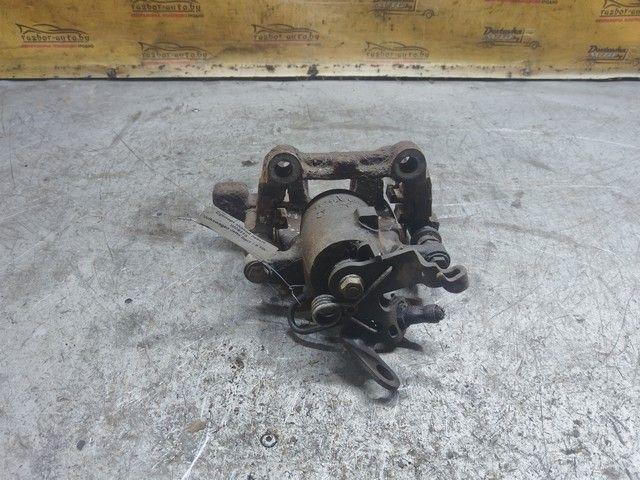 Суппорт задний левый WC83T3 Volkswagen Jetta купить в магазине запчастей бу