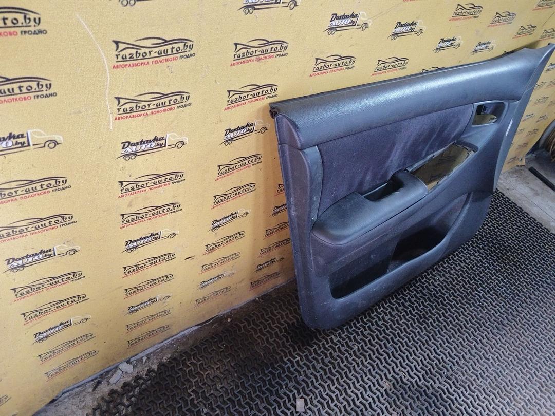 Обшивка двери передней левой (дверная карта) OF47S4 Toyota Corolla купить в магазине запчастей бу