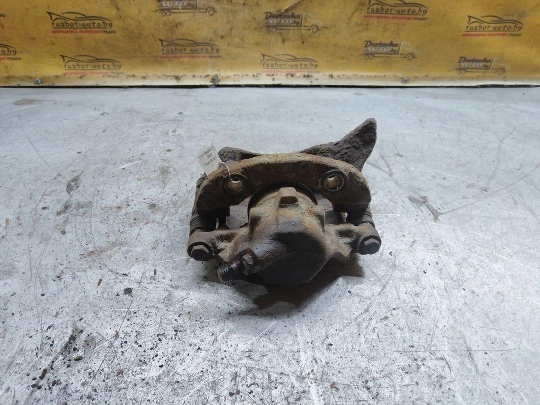 Суппорт передний правый JZSXFH Peugeot 405 купить в магазине запчастей бу