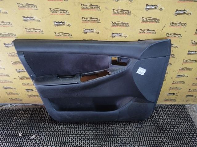 Обшивка двери передней левой (дверная карта) OF47S4 Toyota Corolla купить