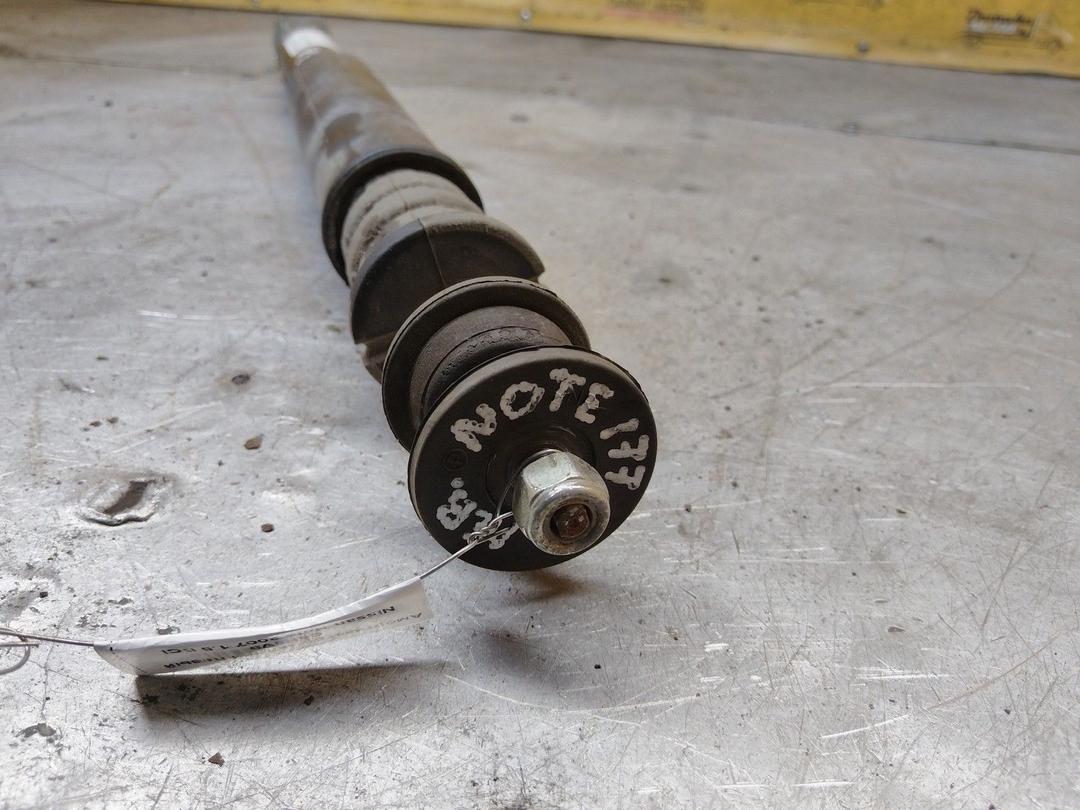 Амортизатор задний левый C6N9V9 Nissan Note купить