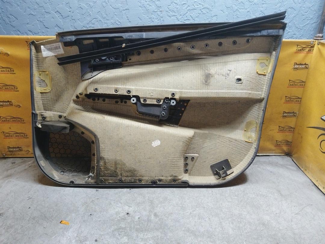 Обшивка двери передней левой (дверная карта) 09G90U Opel Astra купить в магазине запчастей бу
