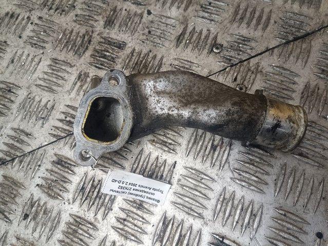 Фланец (тройник) системы охлаждения 27K352 Toyota Avensis купить