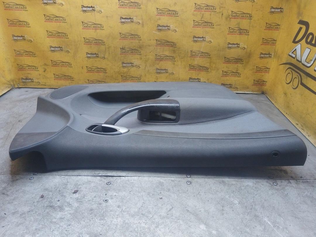 Обшивка двери передней левой (дверная карта) CF4BOK Saab 9-3 купить в магазине запчастей бу