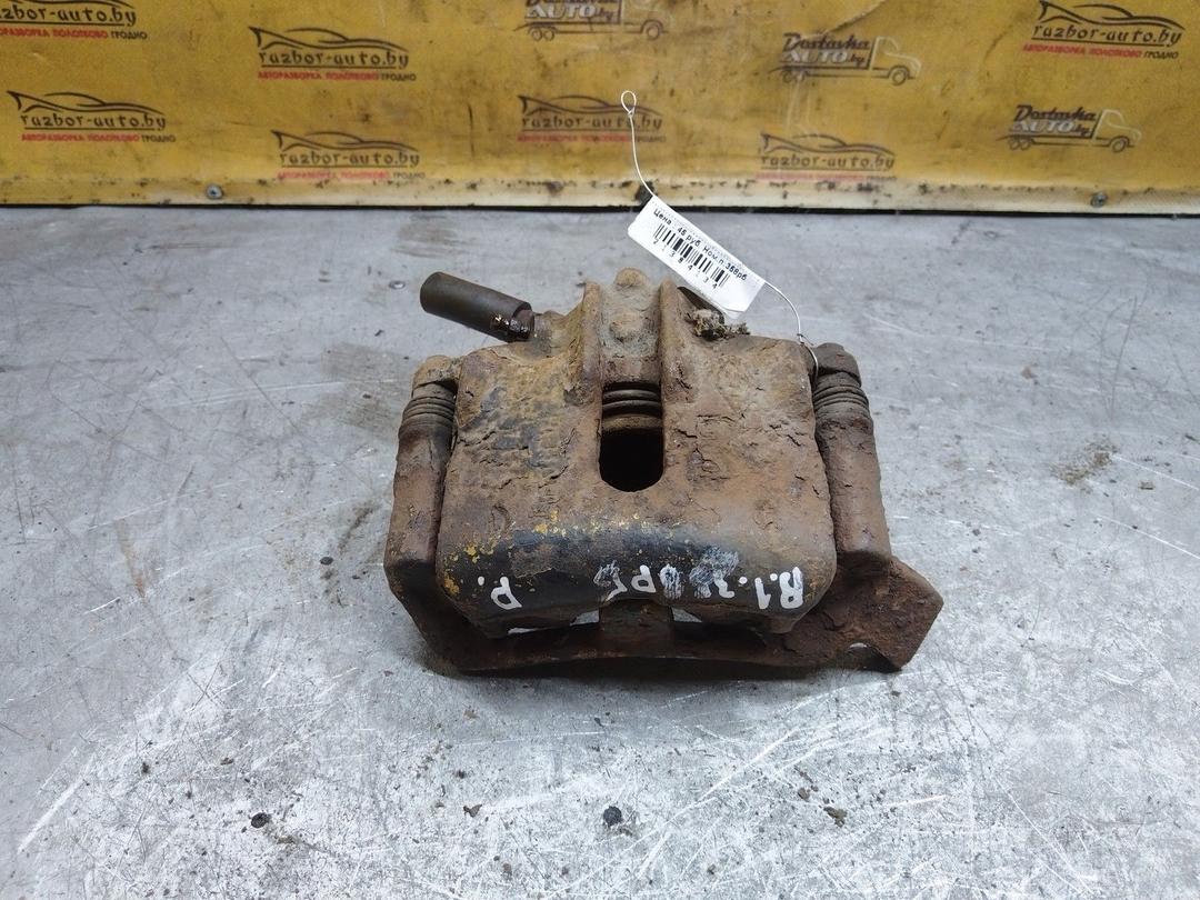 Суппорт передний правый MB2A7I Renault Laguna