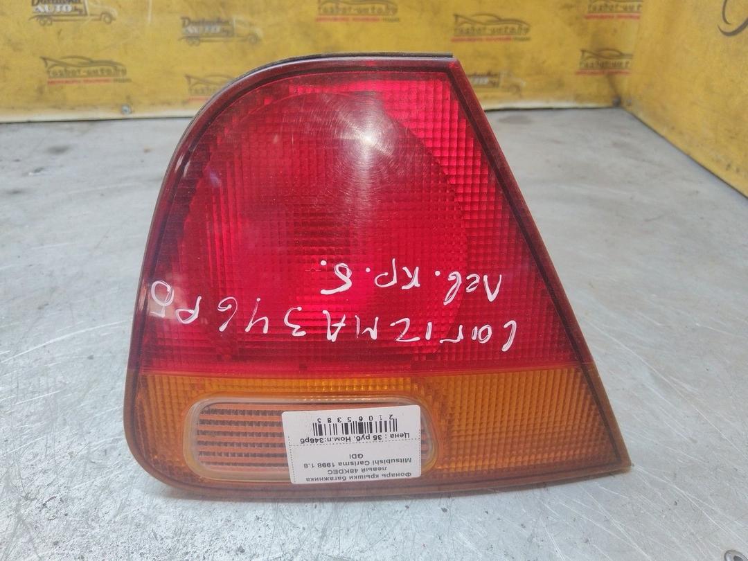 Фонарь крышки багажника левый 48KDEC Mitsubishi Carisma