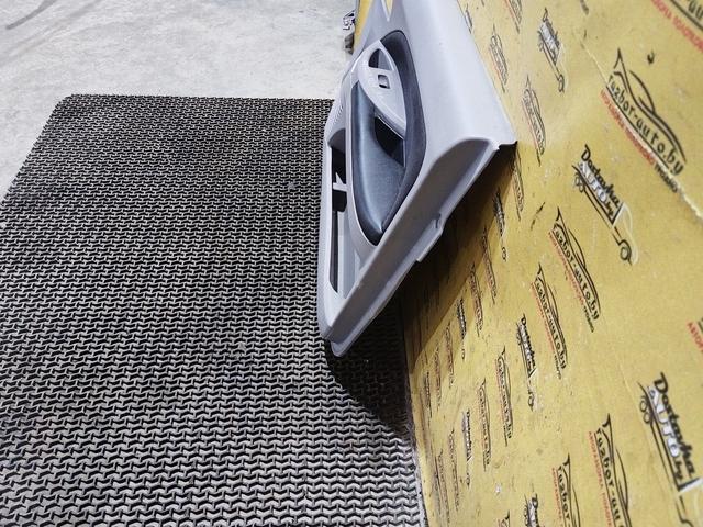 Обшивка двери передней правой (дверная карта) 23857Q Mitsubishi Grandis купить в магазине запчастей бу