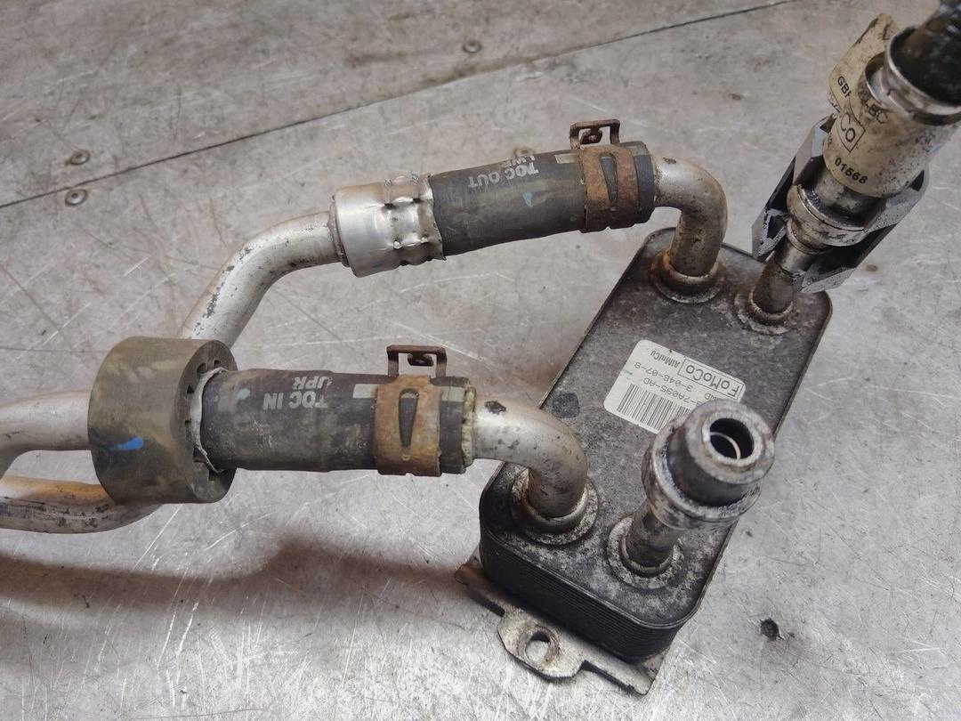 Радиатор масляный E9F7VT Ford Fusion купить с доставкой