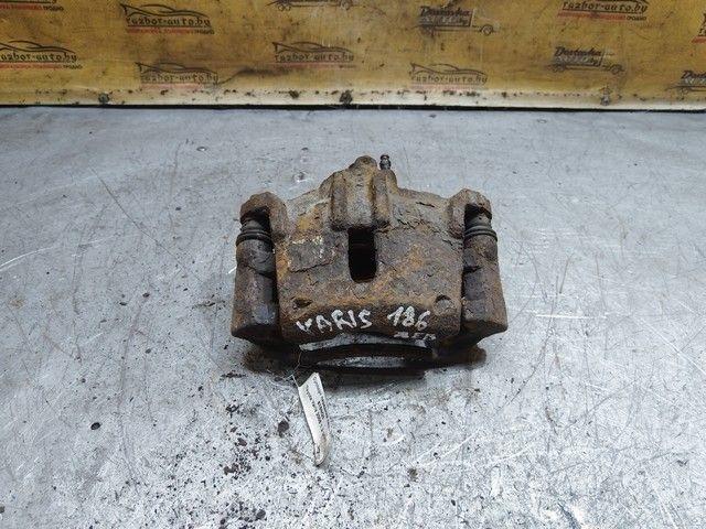 Суппорт передний левый 615NQ3 Toyota Yaris купить