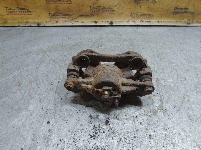 Суппорт передний левый 615NQ3 Toyota Yaris купить на авторазборке