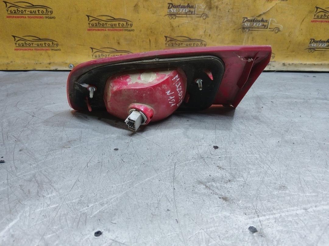 Фонарь крышки багажника левый E4CGO8 Mazda 2 купить в магазине запчастей бу
