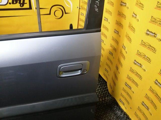 Дверь передняя левая S1RO7Q Opel Zafira купить с доставкой