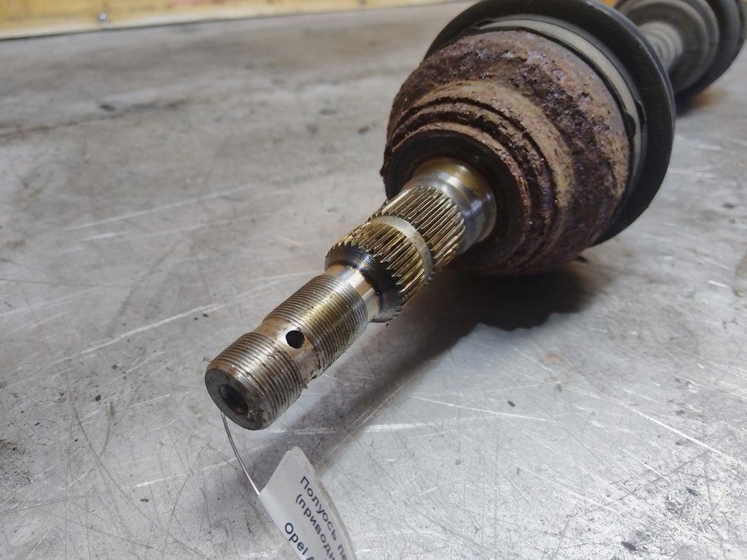 Полуось передняя левая (приводной вал, ШРУС) VSM7TX Opel Astra купить