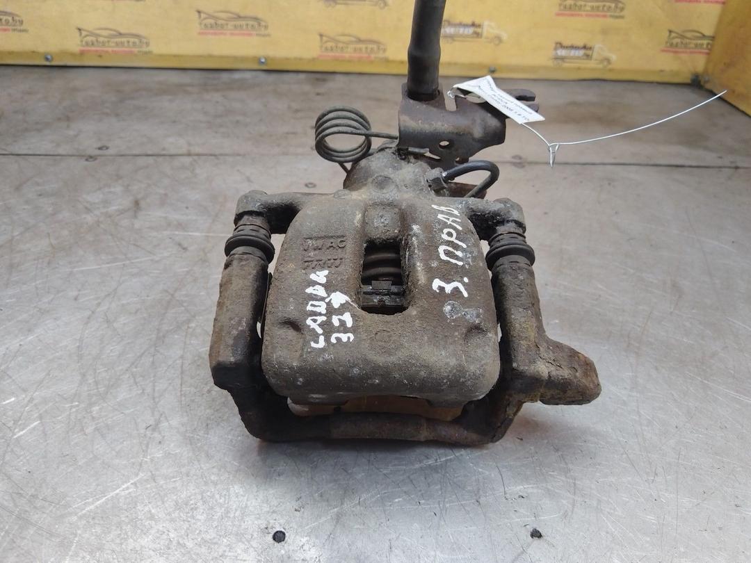 Суппорт задний правый 9CI0UK Volkswagen Caddy