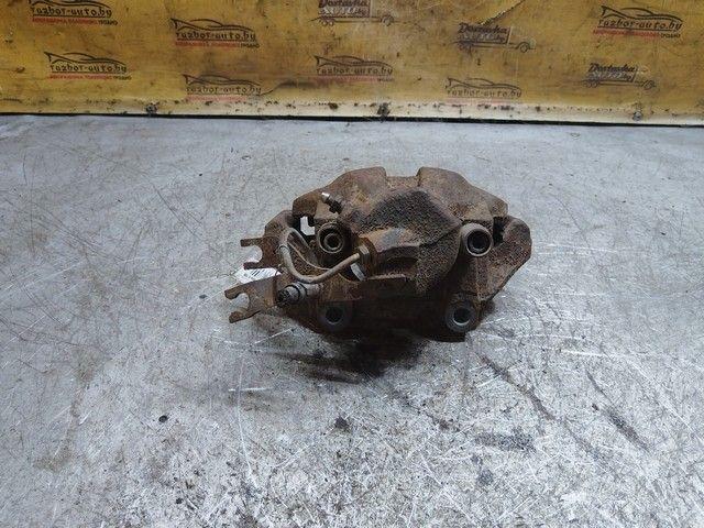 Суппорт передний левый 68I6UY Volkswagen Passat