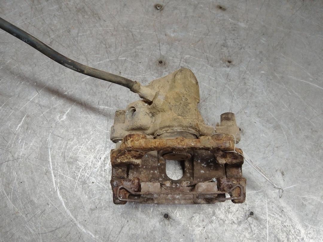 Суппорт задний правый 0JD7D2 Ford Focus купить в магазине запчастей бу