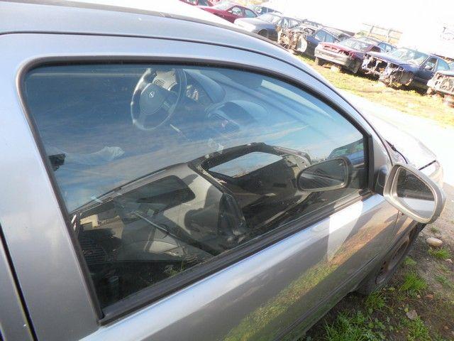 Стекло двери передней правой QROH0M Opel Corsa