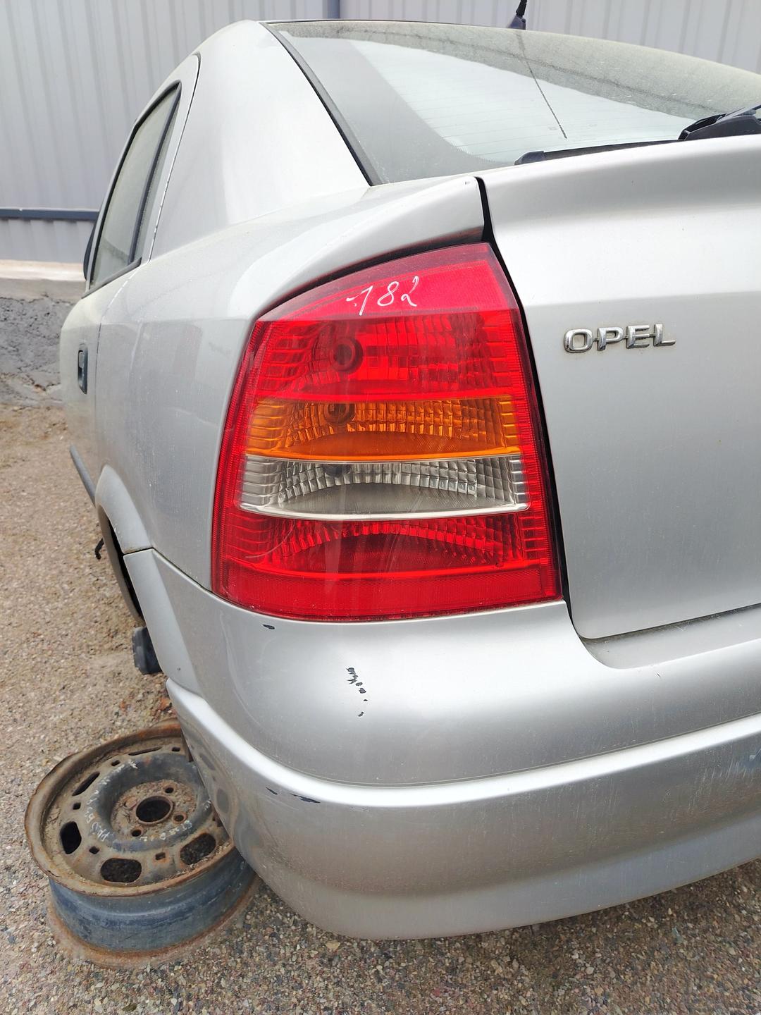 Фонарь задний левый URKG60 Opel Astra - Фото 1