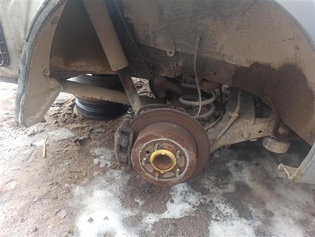 Суппорт задний правый 7CF0F1 Toyota Avensis Verso