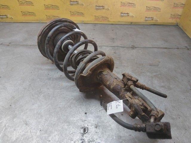 Амортизатор передний правый XGJ9UW Nissan Primera