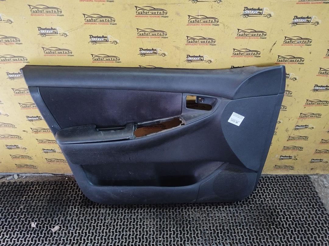 Обшивка двери передней левой (дверная карта) OF47S4 Toyota Corolla купить