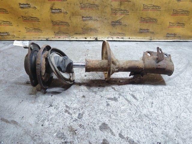 Амортизатор передний левый WO9PR0 Mitsubishi Carisma