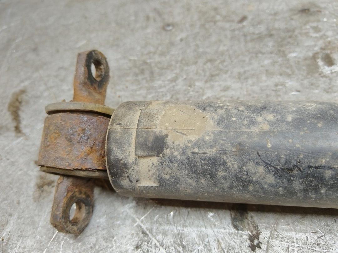 Амортизатор задний левый E4HIL2 Ford Escort купить