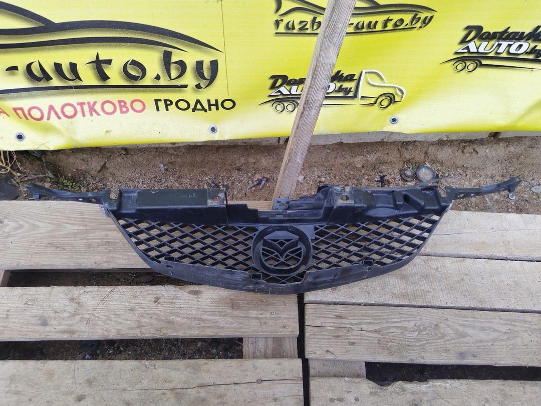 Решетка радиатора Q98JO0 Mazda Premacy купить в магазине запчастей бу