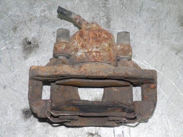 Суппорт передний левый JX25YL Mazda 323F - Фото 3