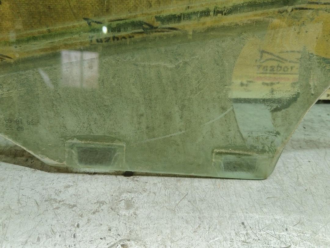 Стекло двери передней правой ETOLVN Skoda Fabia купить в магазине запчастей бу