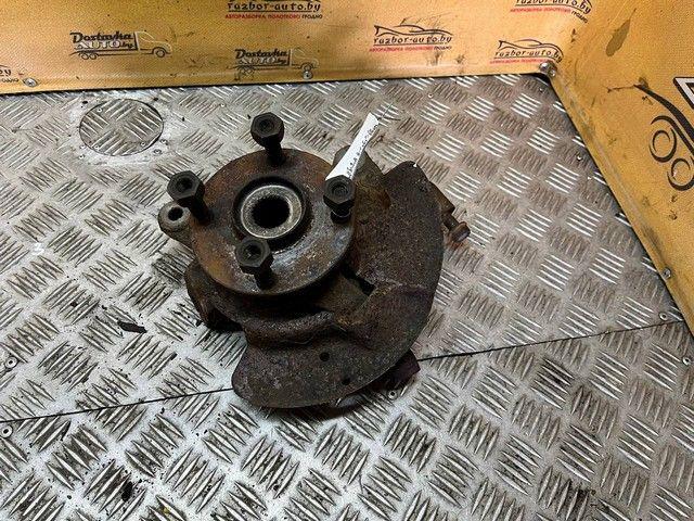 Кулак поворотный левый LYIG3A Mazda 323F