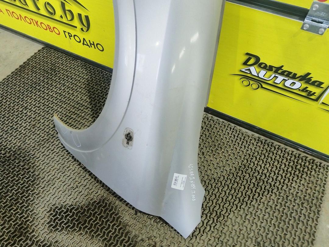 Крыло переднее левое E00ATW Opel Astra купить в магазине запчастей бу