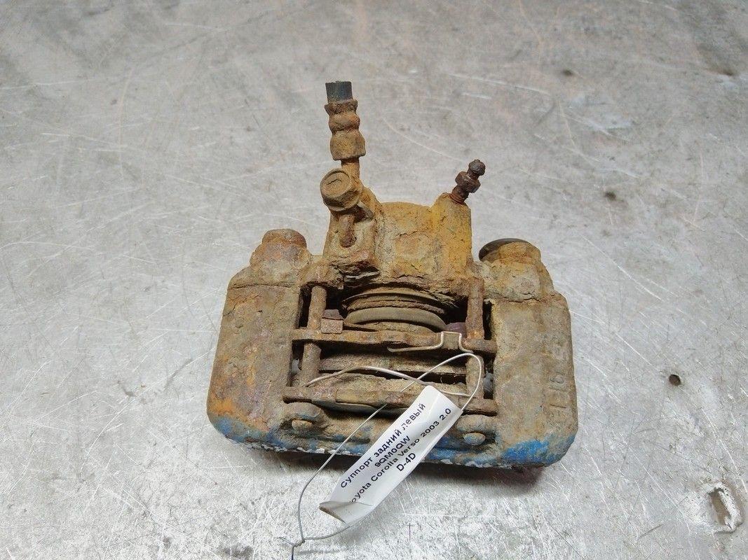 Суппорт задний левый 9QM0QW Toyota Corolla Verso