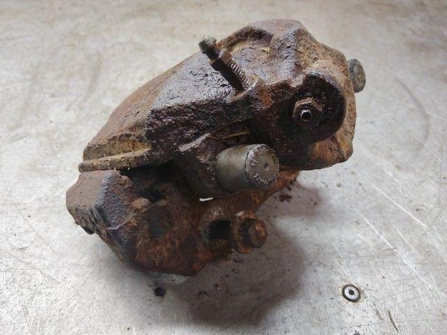 Суппорт передний левый KMO1JI Ford Tourneo Connect купить в магазине запчастей бу