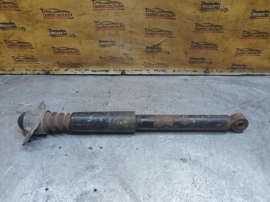 Амортизатор задний левый B6764Q Volkswagen Passat - Фото 1