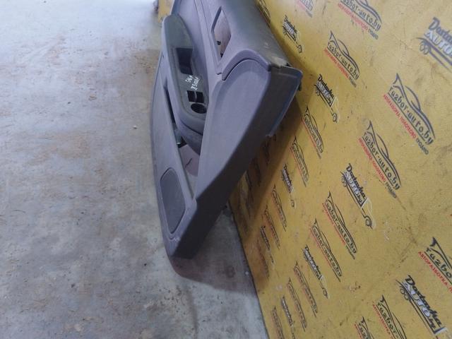 Обшивка двери передней левой (дверная карта) IIOTX5 Ford Focus купить на авторазборке