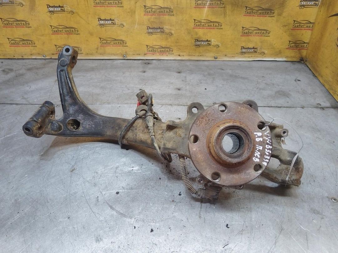 Кулак поворотный левый XHER5L Volkswagen Passat