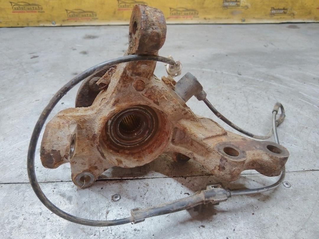 Кулак поворотный левый BGY0PC Toyota Avensis купить в магазине запчастей бу