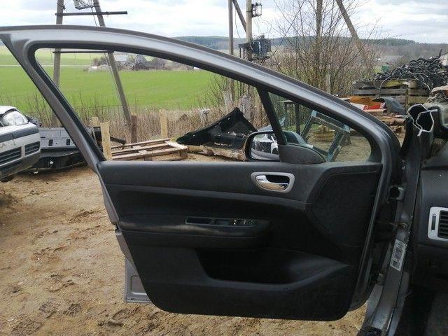Обшивка двери передней левой (дверная карта) ZS3DZB Peugeot 307